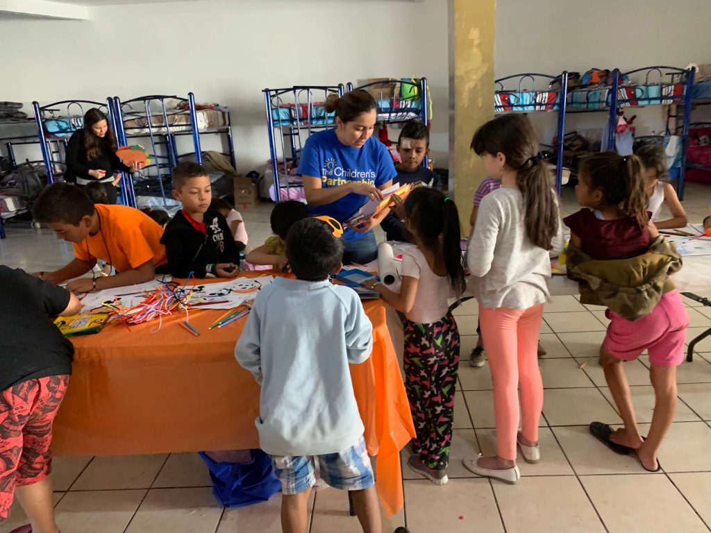 “Teacher, Teacher! Can you give me a coloring page?” Two little boys asked me as we laid out activities during our visit to Templo Embajadores de Jesus – a migrant shelter in Tijuana, Mexicothat houses...